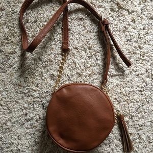 NWOT. Round crossbody purse